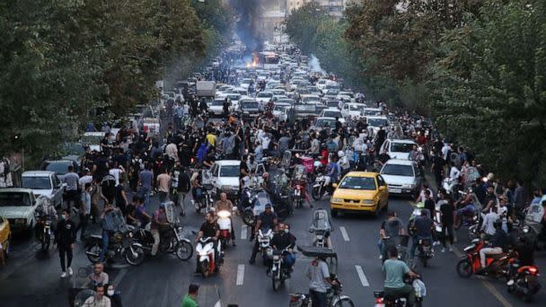 PHOTO: A picture obtained by AFP outside Iran on Sept. 21, 2022, shows Iranian demonstrators taking to the streets of the capital Tehran during a protest for Mahsa Amini, days after she died in police custody. (AFP via Getty Images)