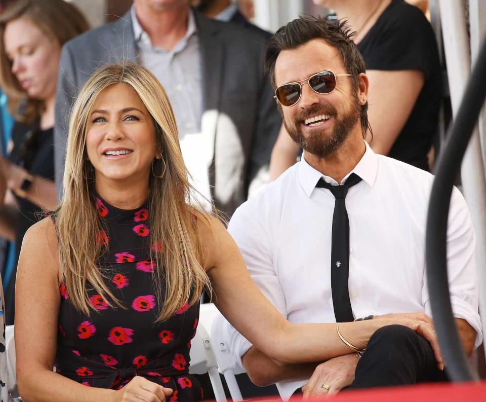 Jennifer Aniston and Justin Theroux attend the ceremony honoring Jason Bateman with a Star on The Hollywood Walk of Fame held on July 26, 2017 in Hollywood, California