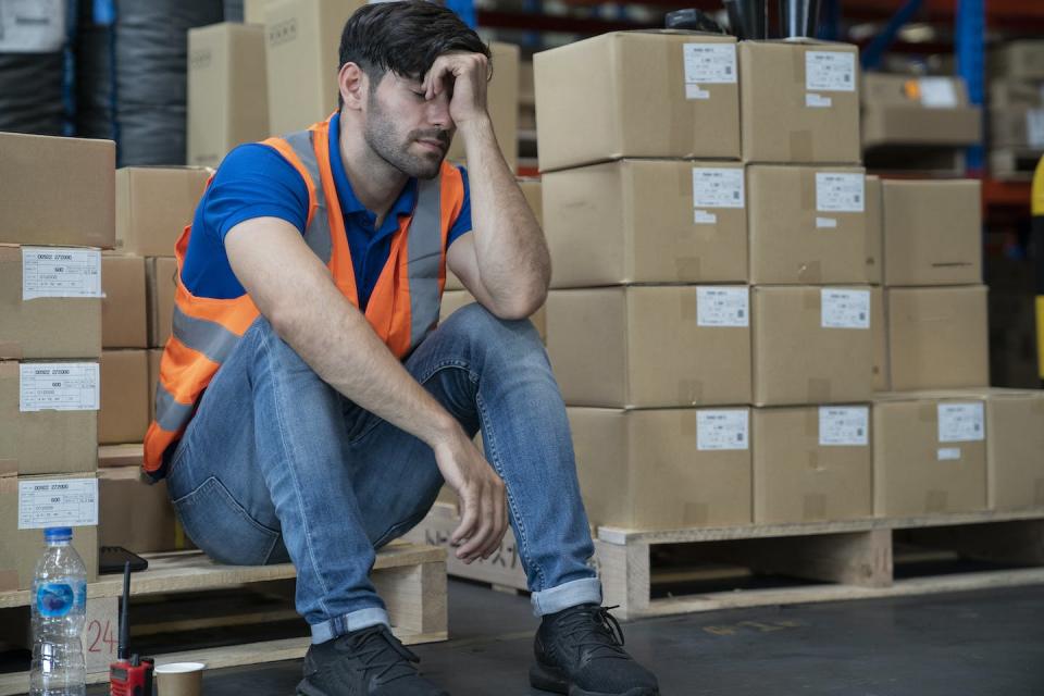 Targeted workers can experience mental and physical health problems. <a href="https://www.gettyimages.com/detail/photo/depressed-worker-feel-tried-after-overwork-and-royalty-free-image/1352460014" rel="nofollow noopener" target="_blank" data-ylk="slk:warodom changyencham/Moment via Getty Images;elm:context_link;itc:0;sec:content-canvas" class="link ">warodom changyencham/Moment via Getty Images</a>