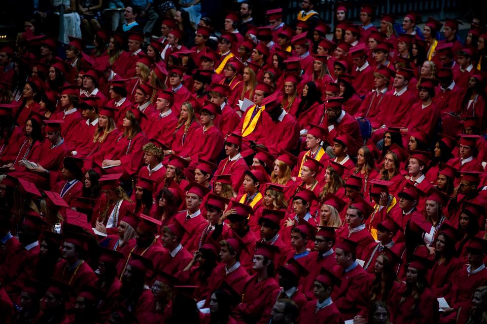 Graduating seniors sit while waiting their turn to get their diplomas during the Ravenwood High School class of 2023 commencement ceremony at the Curb Event Center in Nashville, Tenn., Saturday, May 27, 2023.