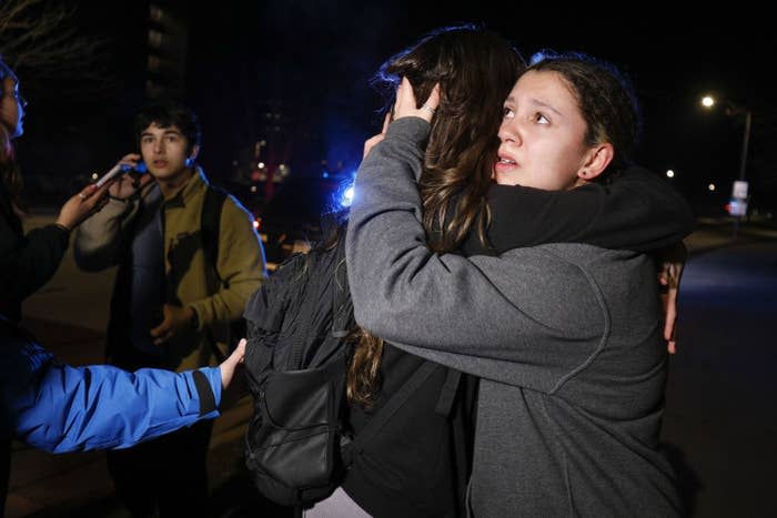 Michigan State University students hug during the active shooter situation.