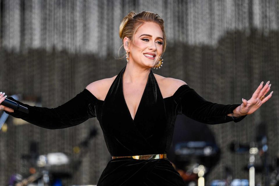 <p>Gareth Cattermole/Getty</p> Adele breaks down in happy tears after helping a couple with their gender reveal.