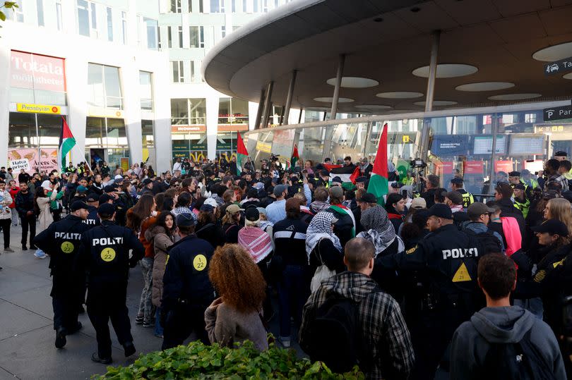 Swedish police forces arrive as pro-Palestinian demonstrators protest with Palestinian flags and placards against Israel's participation -Credit:Getty Images