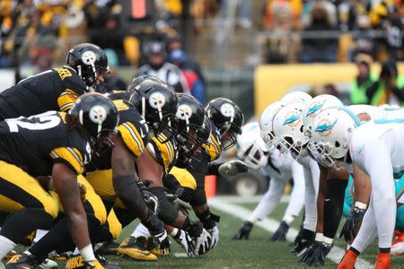 Jan 8, 2017; Pittsburgh, PA, USA; The Pittsburgh Steelers and Miami Dolphins line up during the first half in the AFC Wild Card playoff football game at Heinz Field. Mandatory Credit: Geoff Burke-USA TODAY Sports