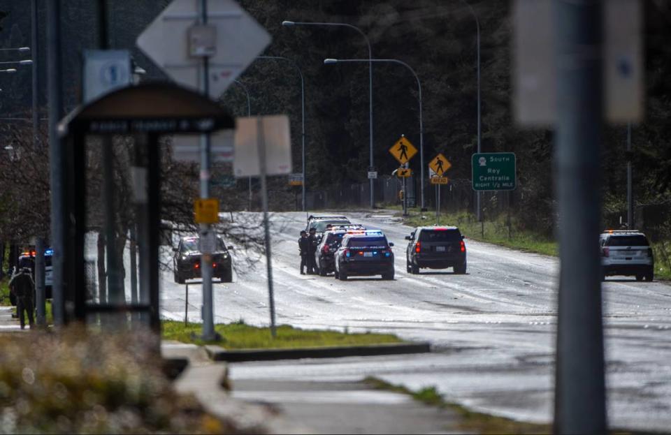 Police work the scene after two Pierce County sheriff’s deputies were shot during a SWAT operation on March 15, 2022 in Spanaway.