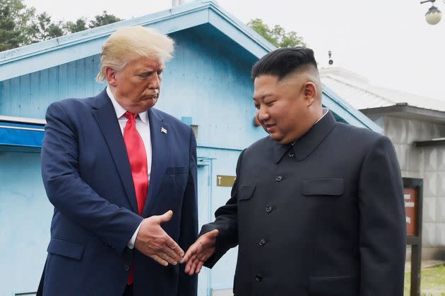 In this June 30, 2019, file photo, North Korean leader Kim Jong Un, right, and U.S. President Donald Trump prepare to shake hands at the border village of Panmunjom in the Demilitarized Zone, South Korea. 