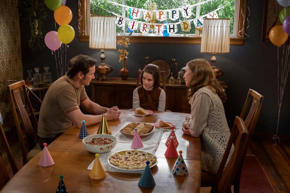 Ed and Lorraine Warren (Patrick Wilson and Vera Farmiga) celebrate a lonely birthday with their daughter, Judy (Mckenna Grace), in "Annabelle Comes Home."