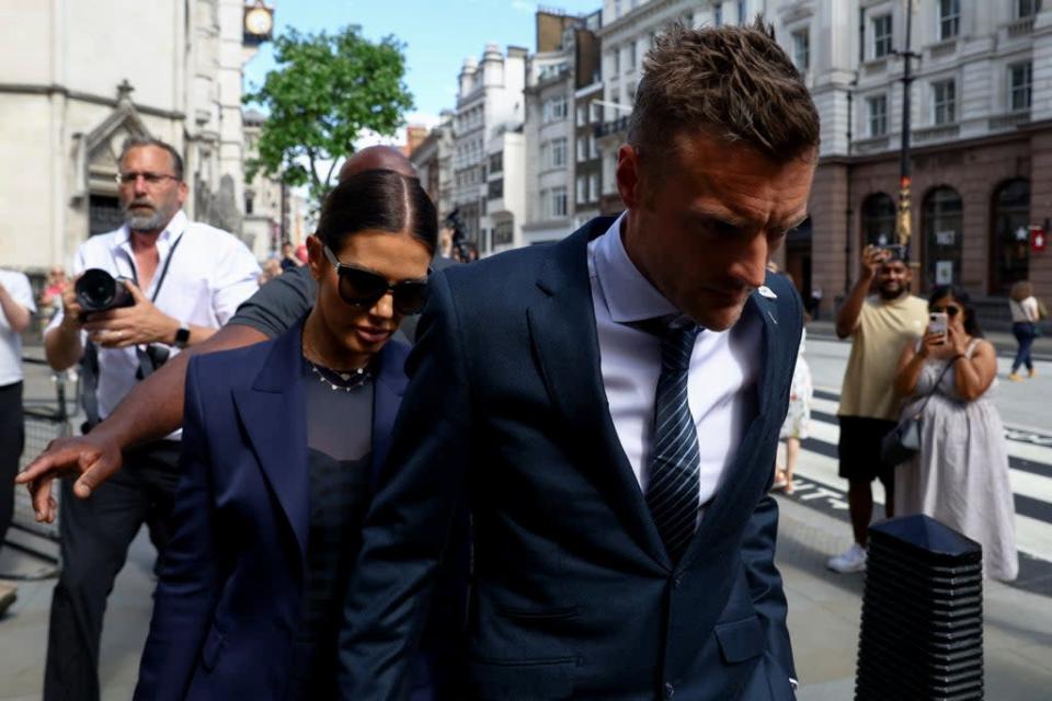 Jamie Vardy and his wife left the court early on Tuesday (REUTERS)