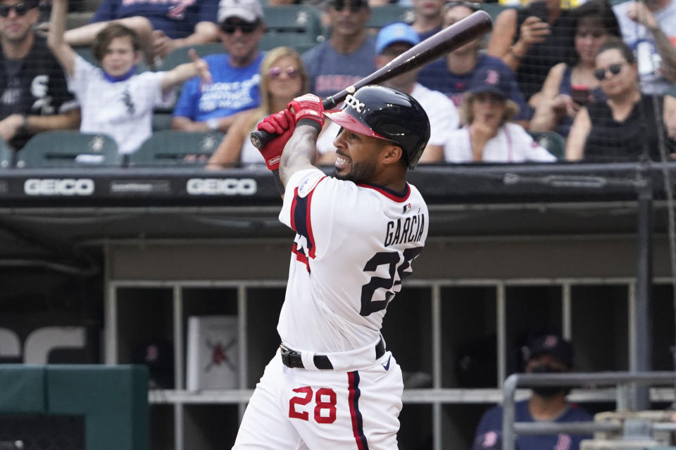 Chicago White Sox' Leury Garcia (28) hits a walk-off home run during the ninth inning against the Boston Red Sox in a baseball game, Sunday, Sept. 12, 2021, in Chicago. (AP Photo/David Banks)