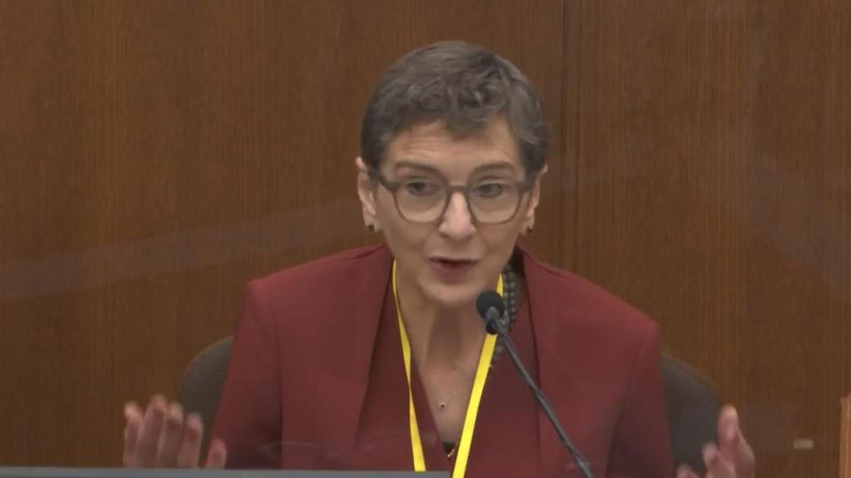 In this image from video, Dr. Lindsey Thomas, a forensic pathologist, now retired, testifies as Hennepin County Judge Peter Cahill presides, Friday, April 9, 2021, in the trial of former Minneapolis police Officer Derek Chauvin at the Hennepin County Courthouse in Minneapolis, Minn. Chauvin is charged in the May 25, 2020 death of George Floyd. (Court TV via AP, Pool)