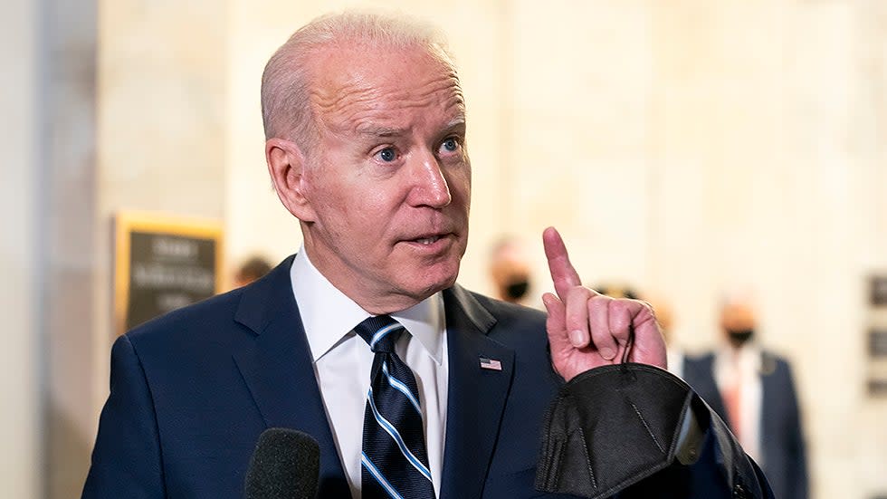President Biden speaks to reporters after a Democratic caucus luncheon at the Senate Russell Office building to discuss voting rights and filibuster reform on Thursday, January 13, 2022.