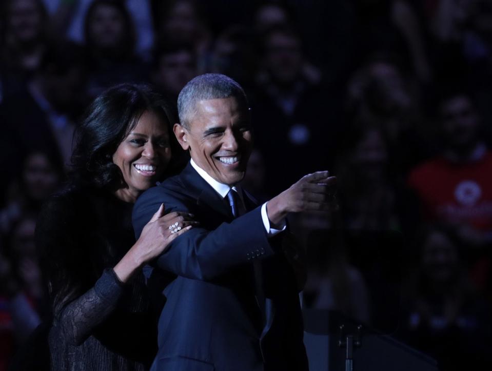 U.S. President Barack Obama greets daughter Malia (not seen) and first lady Michelle Obama on stage after delivering his farewell address at the McCormick Place, the largest convention center in North America, on January 10, 2017 in Chicago, United States.