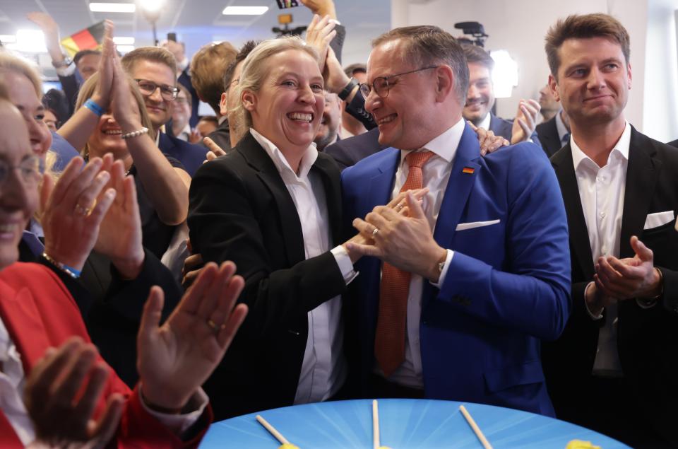 Tino Chrupalla and Alice Weidel, co-leaders of the far-right Alternative for Germany (AfD) political party, celebrate at the AfD election evening gathering following the release of initial election results in European parliamentary elections on June 9, 2024 in Berlin, Germany.