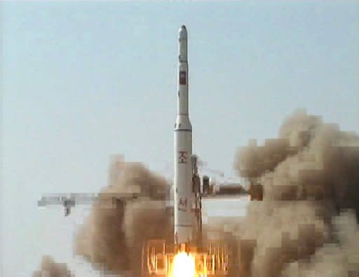 This file photo, released from North Korea's official Korean Central News Agency, shows a Unha-2 rocket, as it is launched in April 2009. N.Korea has begun preparing for a long-range rocket, Unha-3, launch next month despite international condemnation, according to satellite images published by a US-based website