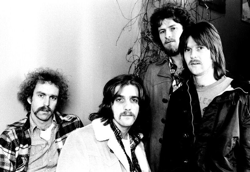 Bernie Leadon, Glenn Frey, Don Henley and Randy Meisner of The Eagles pose for a group portrait in London in 1973.