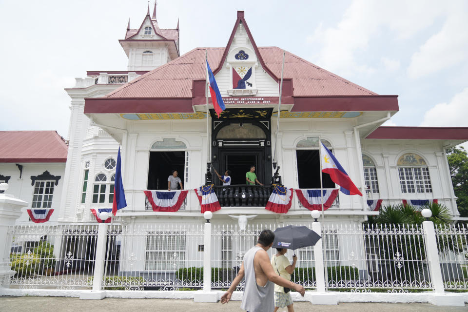 Workers prepare the Emilio Aguinaldo Shrine where Philippine independence from Spain was proclaimed in Kawit, Cavite province, Philippines on Monday, June 10, 2024. The revelry surrounding Philippine Independence Day, which falls on June 12, stretches far beyond the Southeast Asia archipelago. Millions of Filipinos across major U.S. cities, as well as Europe, Australia, and even the United Arab Emirates, will be able to find parades, street fairs, galas, and other gatherings close to home. (AP Photo/Aaron Favila)