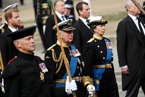 LONDON, ENGLAND - SEPTEMBER 19: King Charles III and Anne, Princess Royal follow behind The Queen's funeral cortege borne on the State Gun Carriage of the Royal Navy as it leaves Westminster Abbey on September 19, 2022 in London, England. Elizabeth Alexandra Mary Windsor was born in Bruton Street, Mayfair, London on 21 April 1926. She married Prince Philip in 1947 and ascended the throne of the United Kingdom and Commonwealth on 6 February 1952 after the death of her Father, King George VI. Queen Elizabeth II died at Balmoral Castle in Scotland on September 8, 2022, and is succeeded by her eldest son, King Charles III.  (Photo by Jeff Spicer/Getty Images)