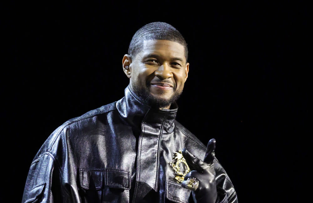 Usher's teenage sons weren't afraid to give their dad some advice on his album credit:Bang Showbiz