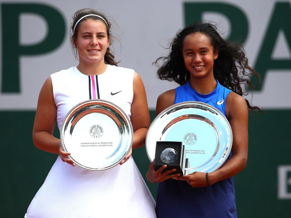 Emma Navarro, left, posed with her runner-up trophy at the 2019 French Open Juniors.
