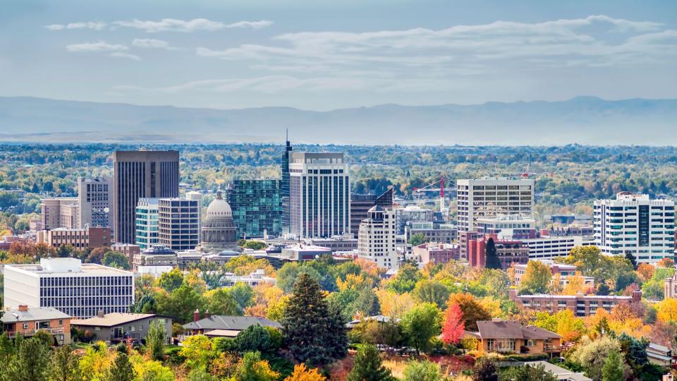 Boise city skyline surrounded by colorful trees in the Fall season