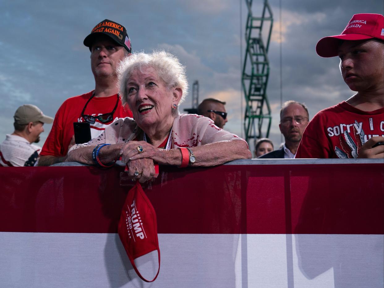 Supporters of President Trump listen as he speaks at a campaign rally in Jacksonville on Thursday night. (Copyright 2020 The Associated Press. All rights reserved)