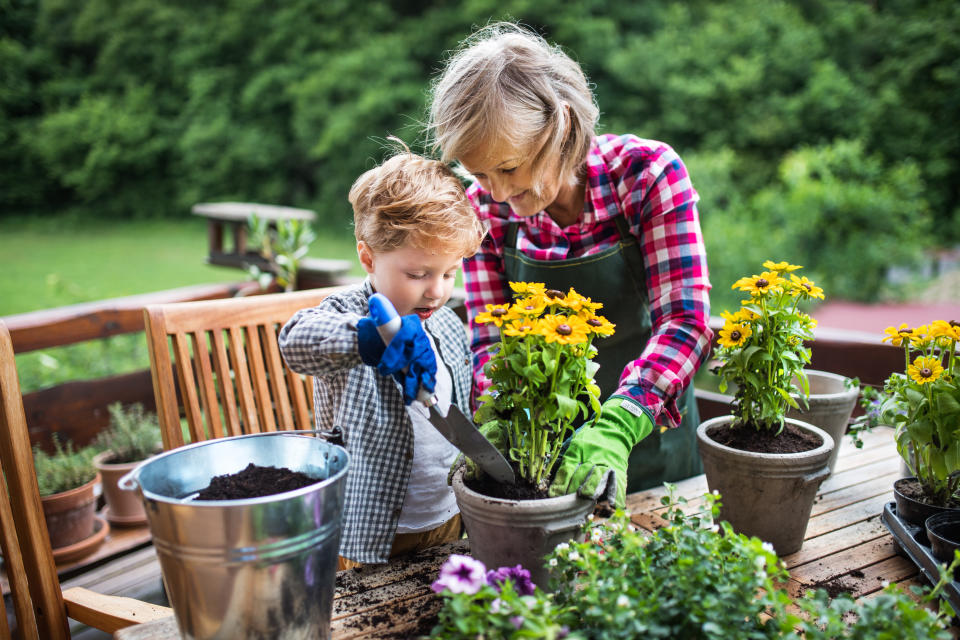 A mum has sparked a debate after wondering if she should pay her mum for looking after her child when she returns to work [Photo: Getty]