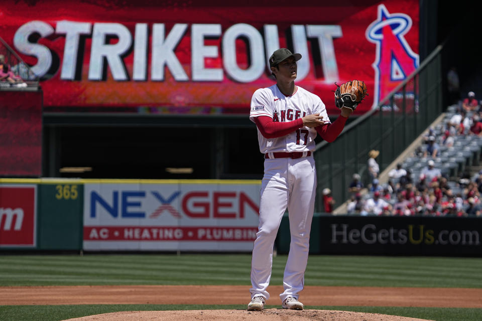 Los Angeles Angels starting pitcher Shohei Ohtani stands on the mound after striking out Minnesota Twins' Kyle Farmer during the second inning of a baseball game Sunday, May 21, 2023, in Anaheim, Calif. (AP Photo/Mark J. Terrill)