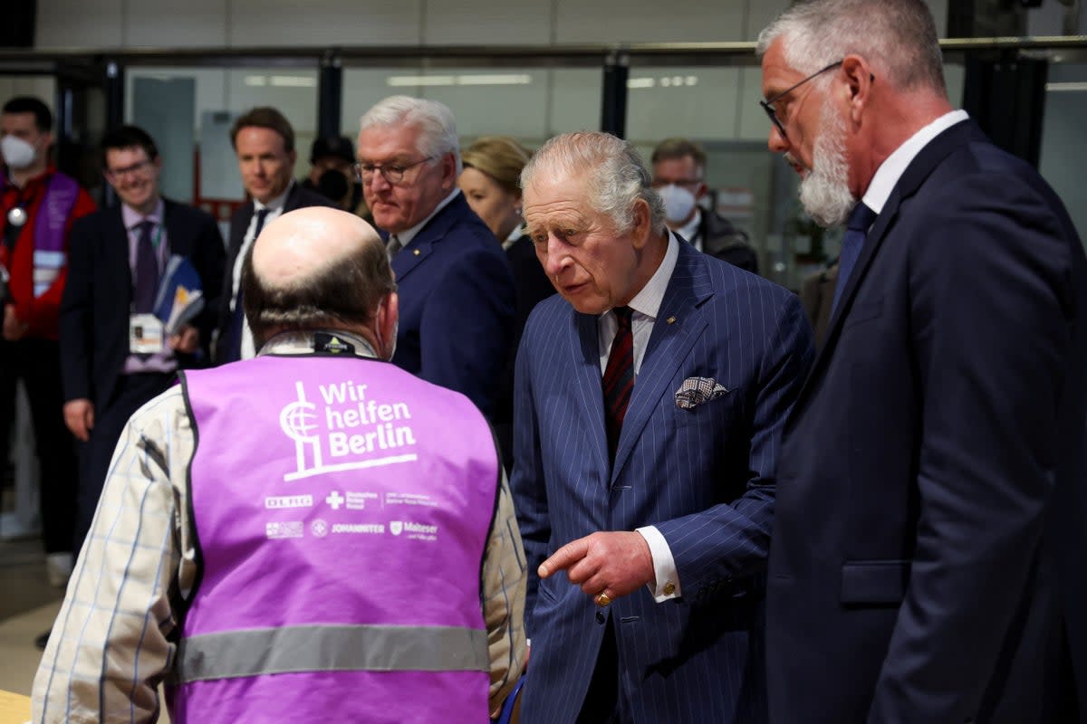 Charles during a visit to a refugee arrival centre in Berlin (Phil Noble/PA) (PA)