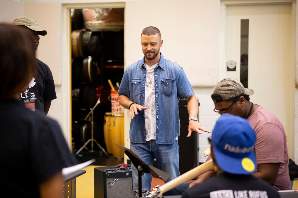 Justin Timberlake working with students at the Stax Music Academy. Timberlake and Levi's helped fund The Song Lab at Stax.