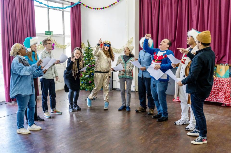 Shaun Williamson can be seen leading the Not So Silent Night choir in a rehearsal (James Linsell-Clark/PinPep)