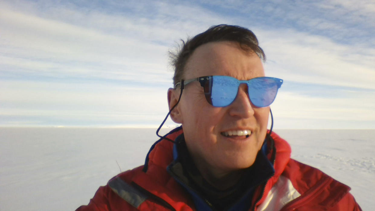 This photo provided by environmental scientist David Holland shows him on the Dotson Ice Shelf in Antarctica on Monday, Jan. 31, 2022. “Nobody can get to Thwaites this year,” Holland said Monday. “We tried to cut through it for a week. Couldn’t do it. So we’re next to it.” (David Holland via AP)