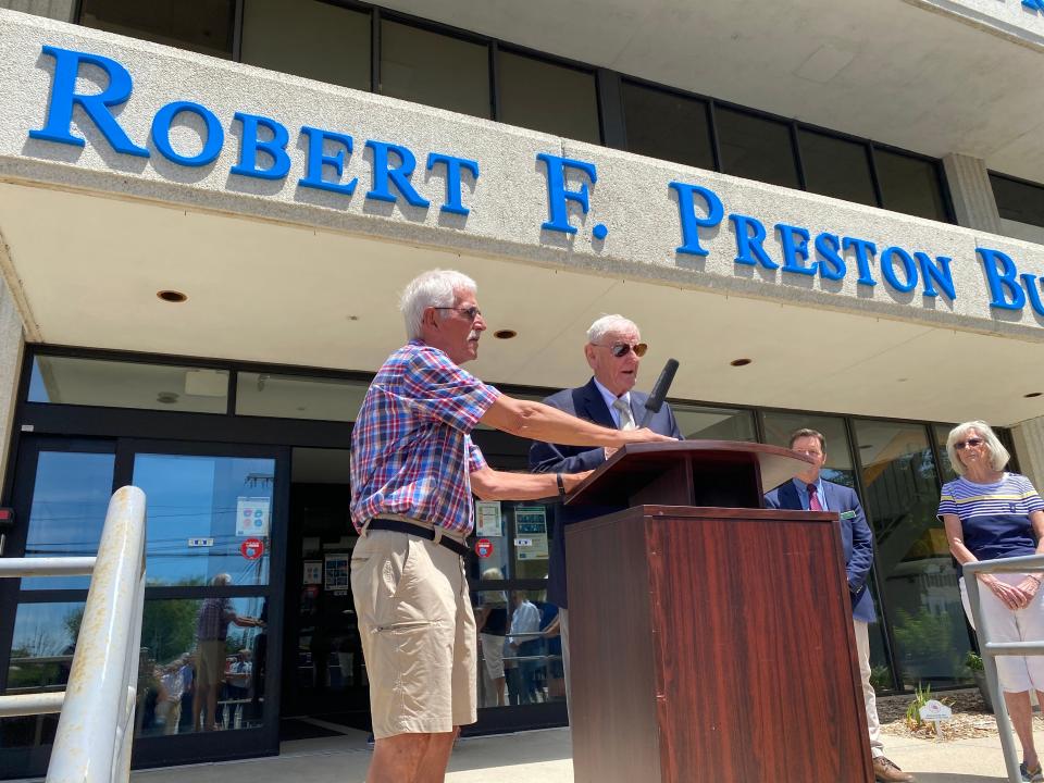 Hampton attorney Al Casassa pays tribute to his late friend Robert Preston at a ceremony unveiling his name across the town office building.