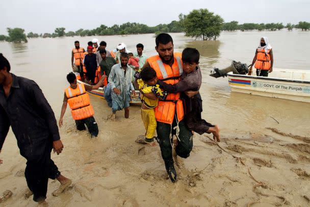 PHOTO: Army troops evacuate people from a flood-hit area in Rajanpur, district of Punjab, Pakistan, Aug. 27, 2022.  (Asim Tanveer/AP)