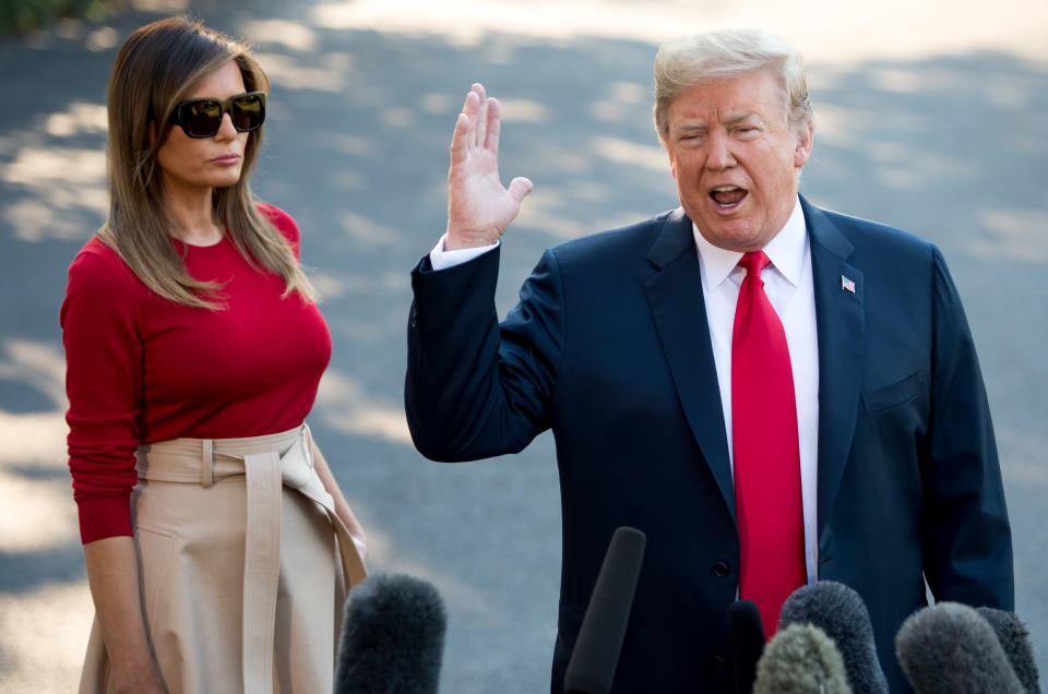 Melania Trump wore pieces from Christian Louboutin and Martin Grant as she joined President Trump on the South Lawn. (Photo: Saul Loeb/AFP)