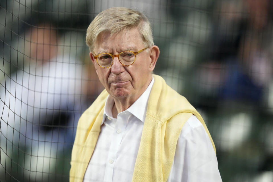 George Will, among other things a writer on baseball, looks around Wrigley Field before a baseball game between the Chicago Cubs and the Pittsburgh Pirates on Thursday, Sept. 21, 2023, in Chicago. (AP Photo/Charles Rex Arbogast)