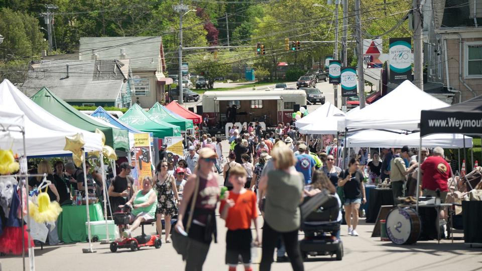 Weymouth residents gather in Jackson Square on Saturday, May 14, 2022, for the first of several village-centric events celebrating Weymouth's 400th anniversary.