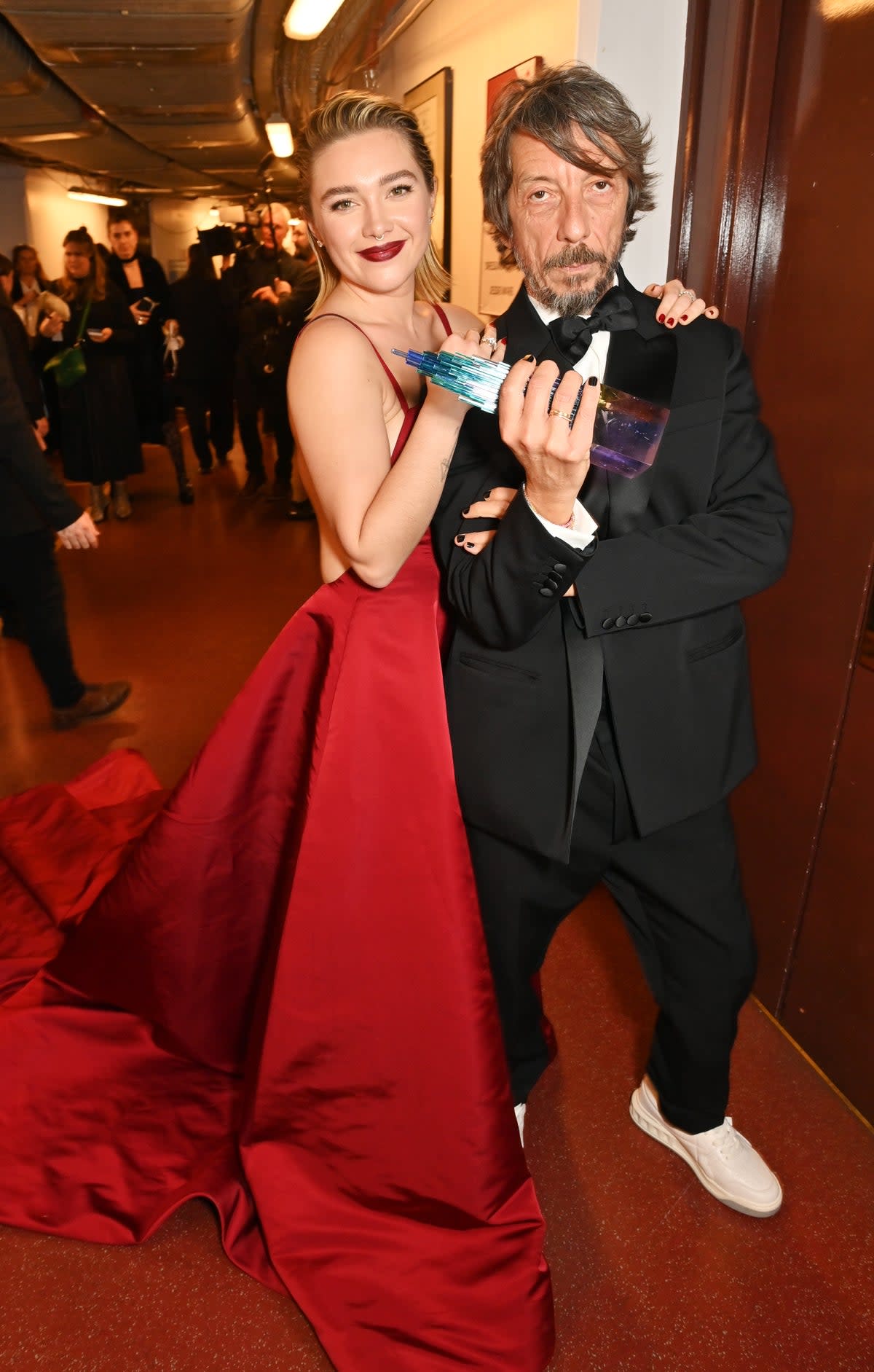 Florence Pugh and Valentino Creative Director Pierpaolo Piccioli, winner of the Designer of the Year Award, pose backstage at The Fashion Awards 2022 at Royal Albert Hall on December 5, 2022 (Dave Benett/Getty Images)