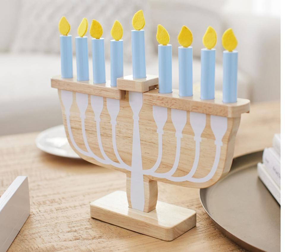 <p><a href="https://go.redirectingat.com?id=74968X1596630&url=https%3A%2F%2Fwww.potterybarnkids.com%2Fproducts%2Fwooden-toy-menorah%2F&sref=https%3A%2F%2Fwww.womansday.com%2Frelationships%2Ffamily-friends%2Fg45631247%2Fhanukkah-gift-ideas-for-kids%2F" rel="nofollow noopener" target="_blank" data-ylk="slk:Shop Now;elm:context_link;itc:0;sec:content-canvas" class="link ">Shop Now</a></p><p>Wooden Toy Menorah</p><p>potterybarnkids.com</p><p>$49.00</p>