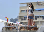 Girls sit and stand on a boat deck in the harbour near the Circuit de Monaco on May 25, 2012 in Monte Carlo. AFP PHOTO / BORIS HORVATBORIS HORVAT/AFP/GettyImages