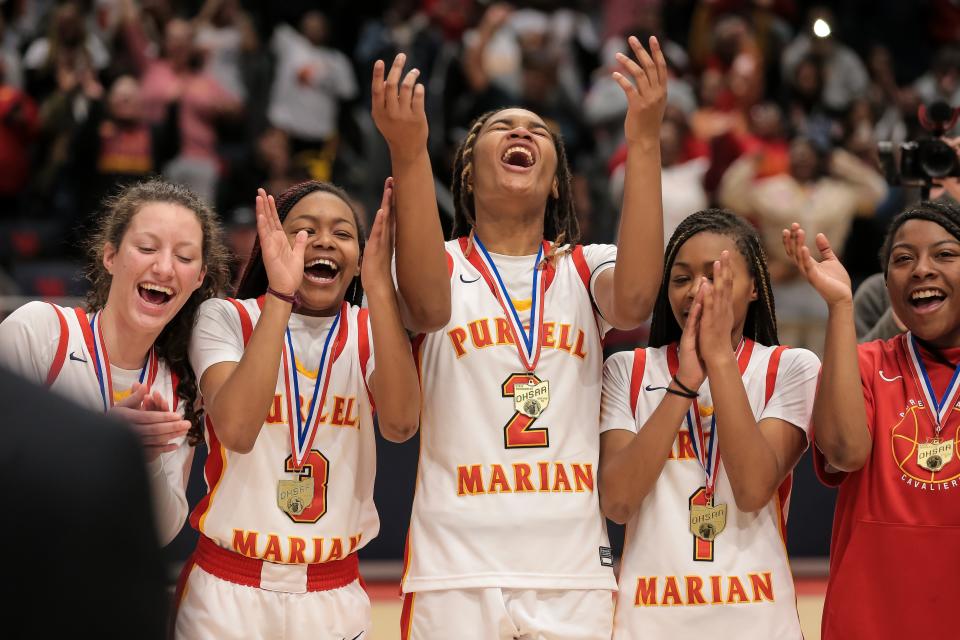 Dee Alexander (2) helped lead Purcell Marian to a Division III state championship last season.