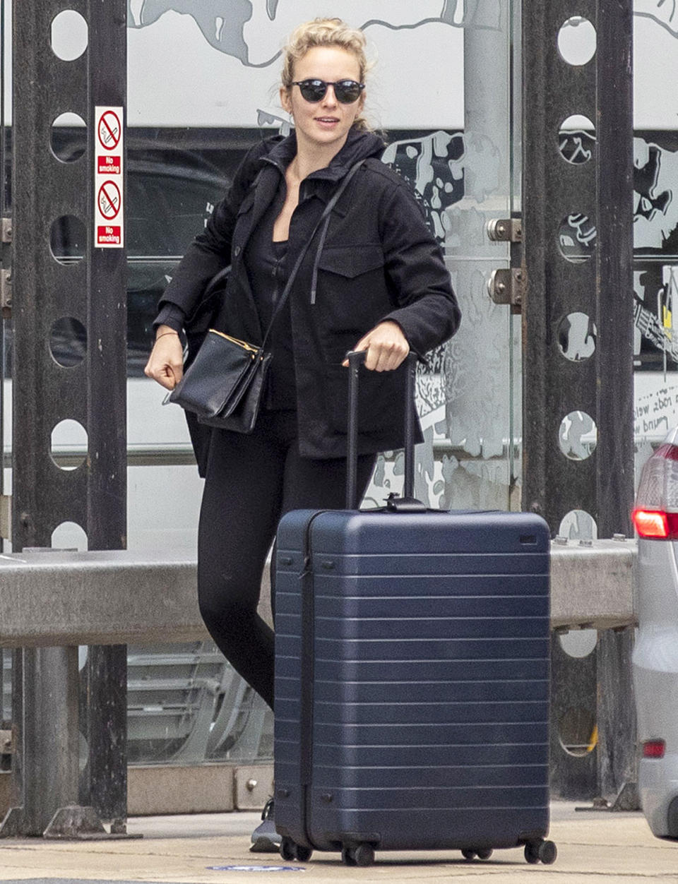 <p><i>Killing Eve </i>star Jodie Comer wears all black as she catches a train to London from Liverpool on Sunday. </p>