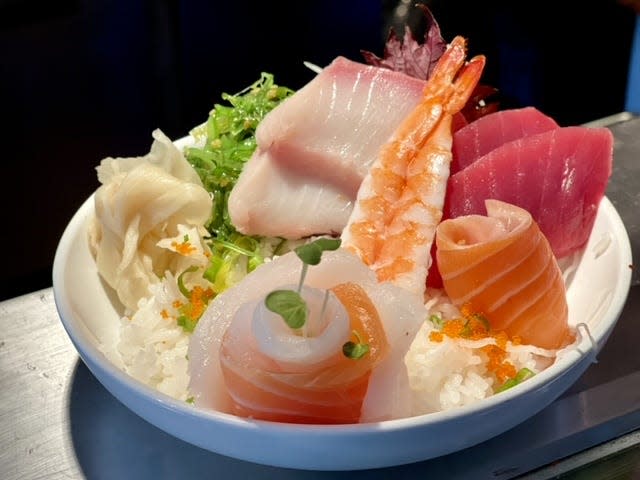 Various thin cuts of fresh-off-the-boat fish and a single cooked shrimp make up the sashimi bowl at Mac's Fish House in Provincetown. If you prefer your fish cooked, Mac's Seafood's five locations offer gluten-free fried fish and shellfish.