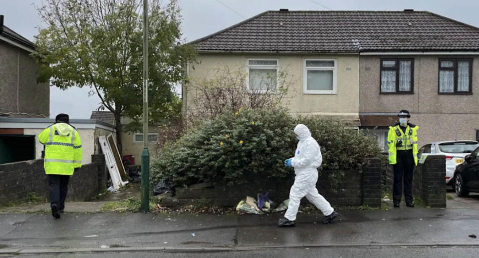 Flowers left outside the house where Jack Lis was killed. Source: PA
