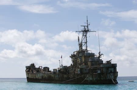 BRP Sierra Madre, a dilapidated Philippine Navy ship that has been aground since 1999 is pictured on the disputed Second Thomas Shoal, part of the Spratly Islands, in the South China Sea March 29, 2014. REUTERS/Erik De Castro