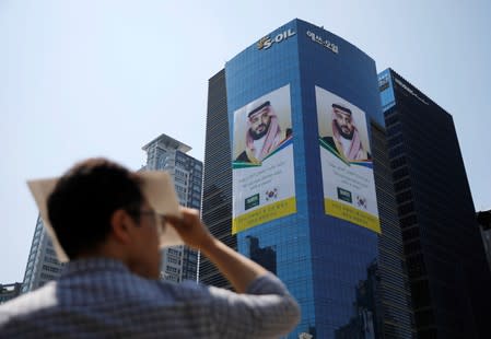 Giant banners welcoming Saudi Crown Prince Mohammed bin Salman hangs on the S-Oil headquarters building in Seoul