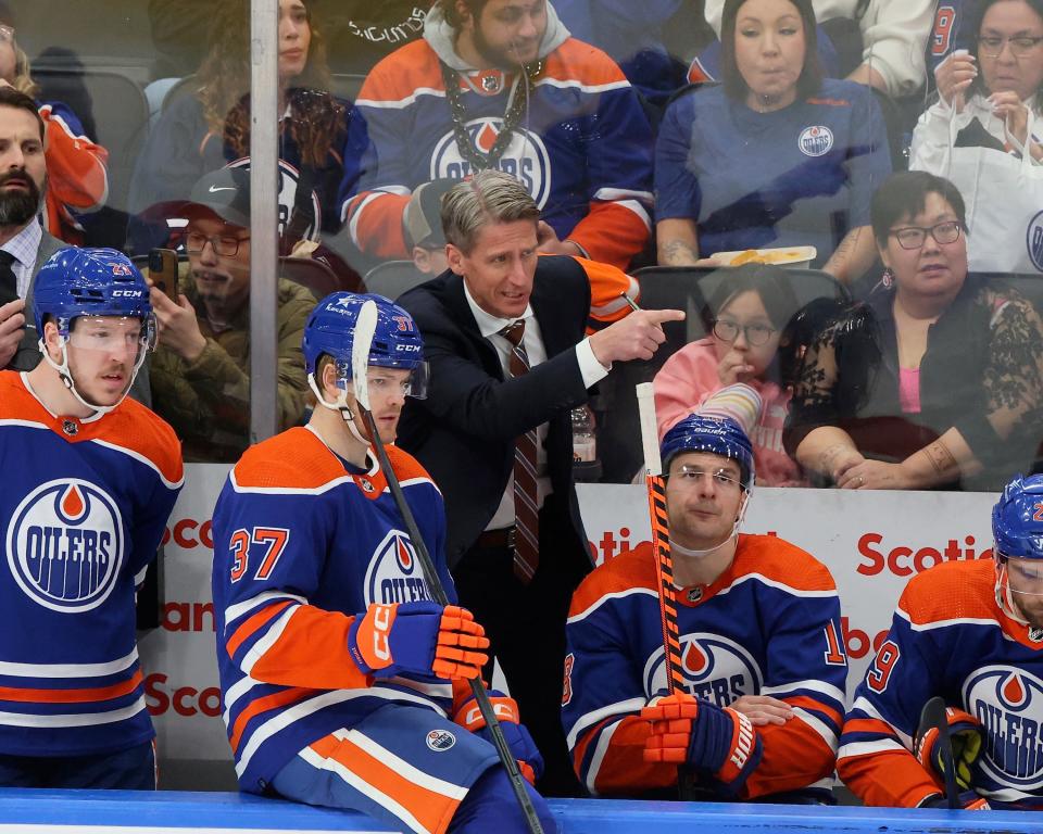 EDMONTON, CANADA - NOVEMBER 15: The Edmonton Oilers new coach Kris Knoblauch giving his players instructions in the second period against the Seattle Kraken at Rogers Place on November 15, 2023 in Edmonton, Alberta, Canada.