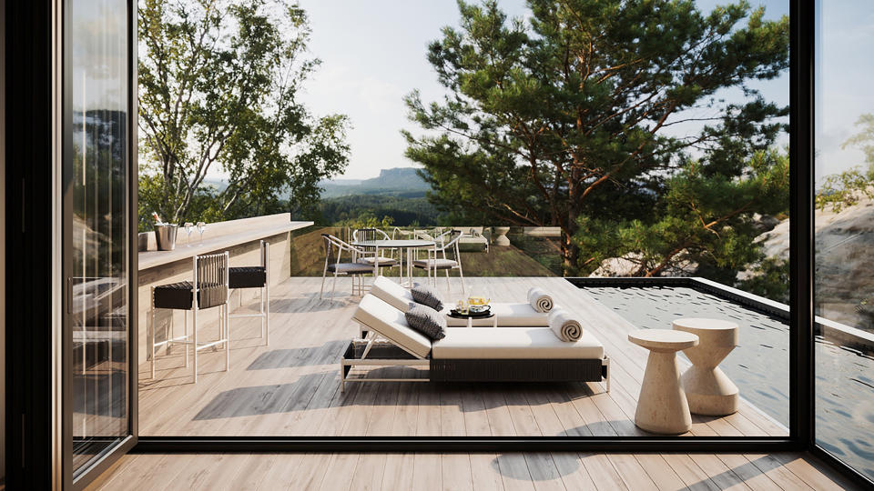 <p> If you want to bring a sense of luxury to your garden design ideas, then you can&apos;t go far wrong with a pool. Add in a sleek bar and you&apos;re all set for a chic summer of relaxation. </p> <p> Keep the range of materials and color palette pared-down for a serene and sophisticated vibe. Here, pale decking makes a gorgeous complement to monochrome furniture, and we&apos;re a big fan of those sculptural end tables, too. </p> <p> Naturally, a view like this will take any garden design ideas up a notch, but if yours isn&apos;t&#xA0;<em>quite&#xA0;</em>the same, then a few sleek raised beds filled with leafy foliage or a potted olive tree wouldn&apos;t go amiss. </p>
