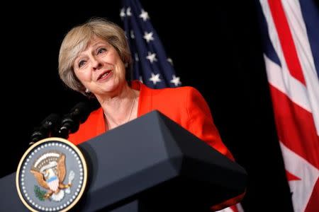 Britain's Prime Minister Theresa May answers a reporter's question after a bilateral meeting with U.S. President Barack Obama alongside the G20 Summit, in Ming Yuan Hall at Westlake Statehouse in Hangzhou, China September 4, 2016. REUTERS/Jonathan Ernst