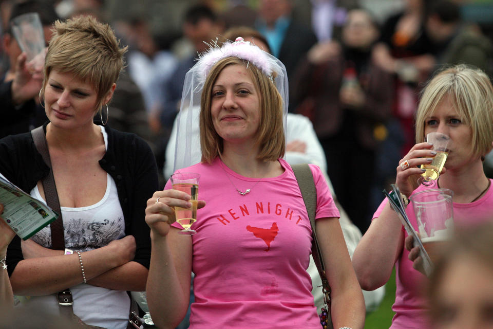 Racegoers on a hen do at Sandown Park Racecourse. Photo: Stephen Pond/EMPICS Sport