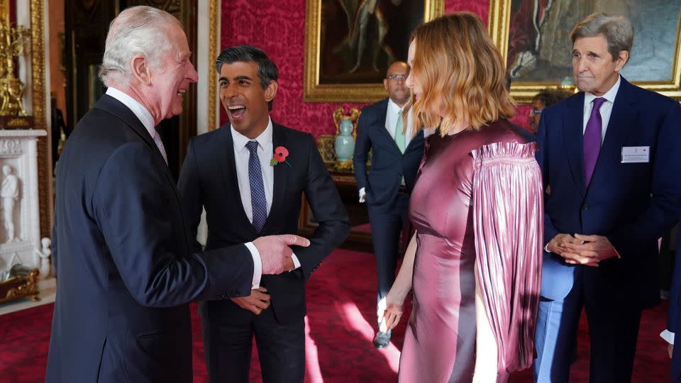 Stella McCartney in conversation with (from left to right) King Charles III, British Prime Minister Rishi Sunak and US Special Presidential Envoy for Climate John Kerry during a reception at Buckingham Palace ahead of last year's UN climate change summit. - Jonathan Brady/PA Wire/AP